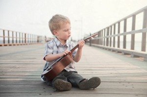 Boy with guitar baby names inspired by music